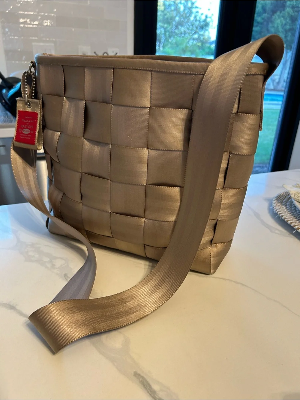 Harvey’s The Original Crossbody Shoulder Bag - Taupe. 13” x 11” x 4”